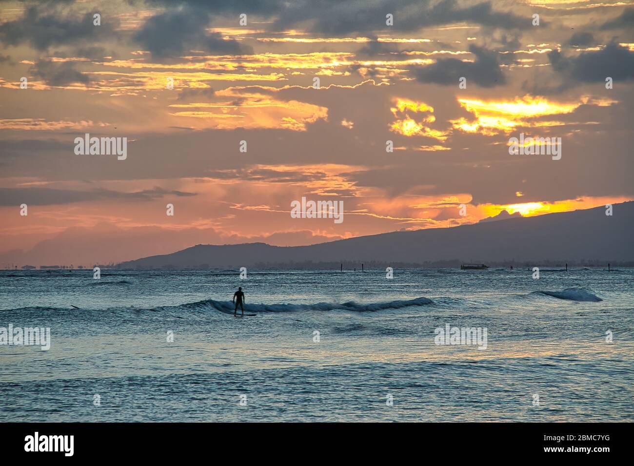 Couple surfing oahu hawaii hi-res stock photography and images - Alamy