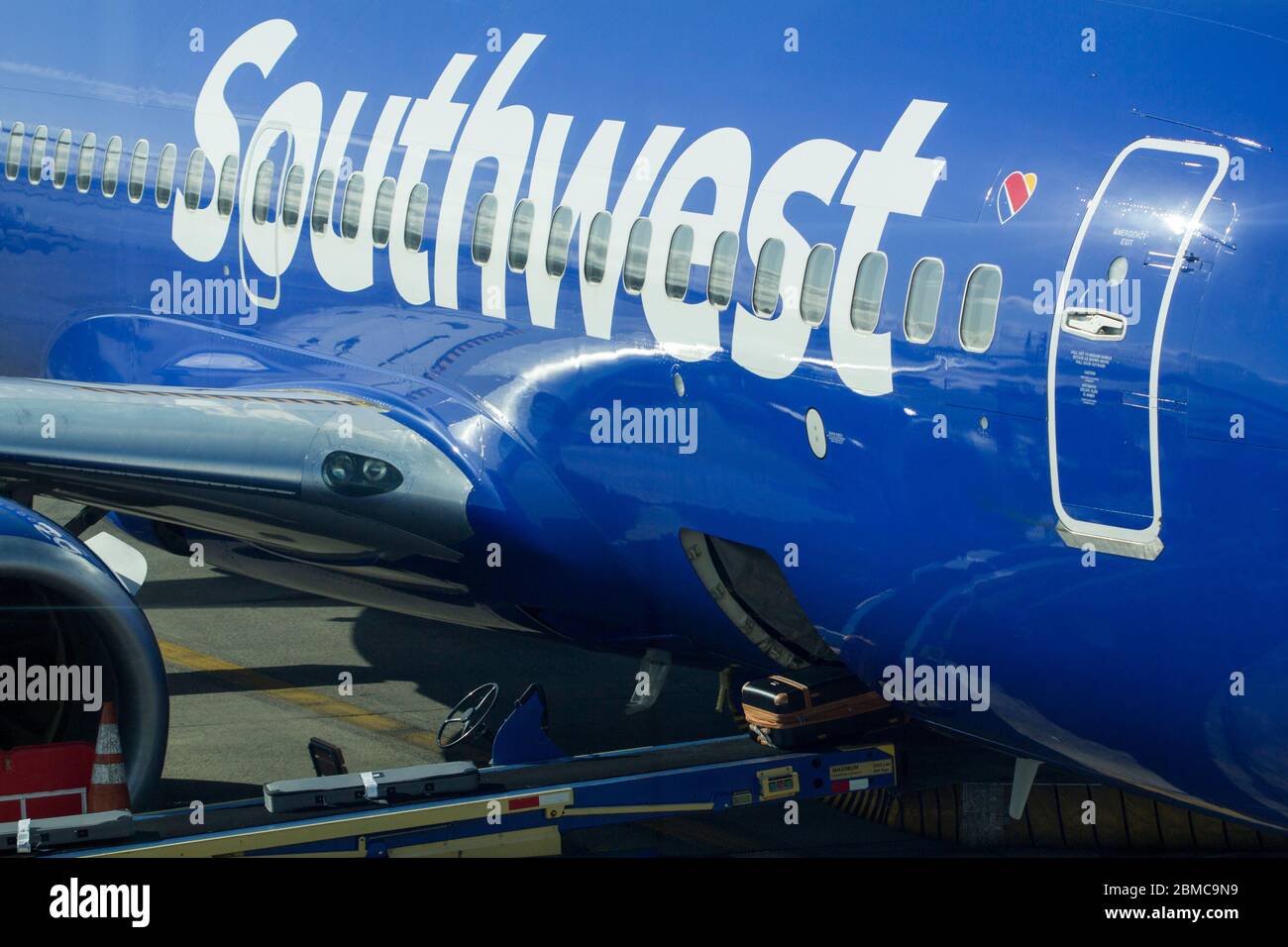The Southwest logo is seen on a Southwest Airlines passenger aircraft in Portland International Airport on Feb 16, 2020. Stock Photo