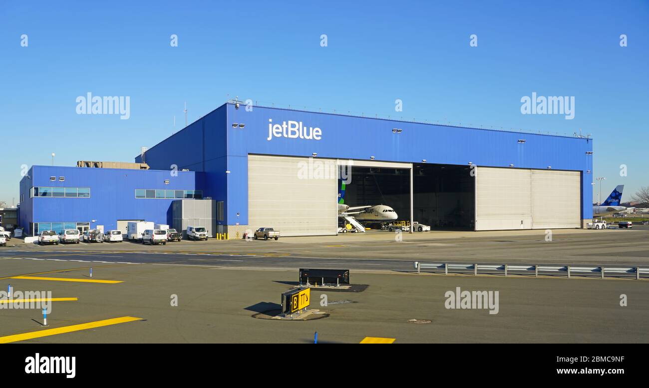 NEW YORK -23 NOV 2019-  An airplane from JetBlue (B6) in a Jet Blue maintenance hangar at the John F. Kennedy International Airport (JFK) in New York Stock Photo