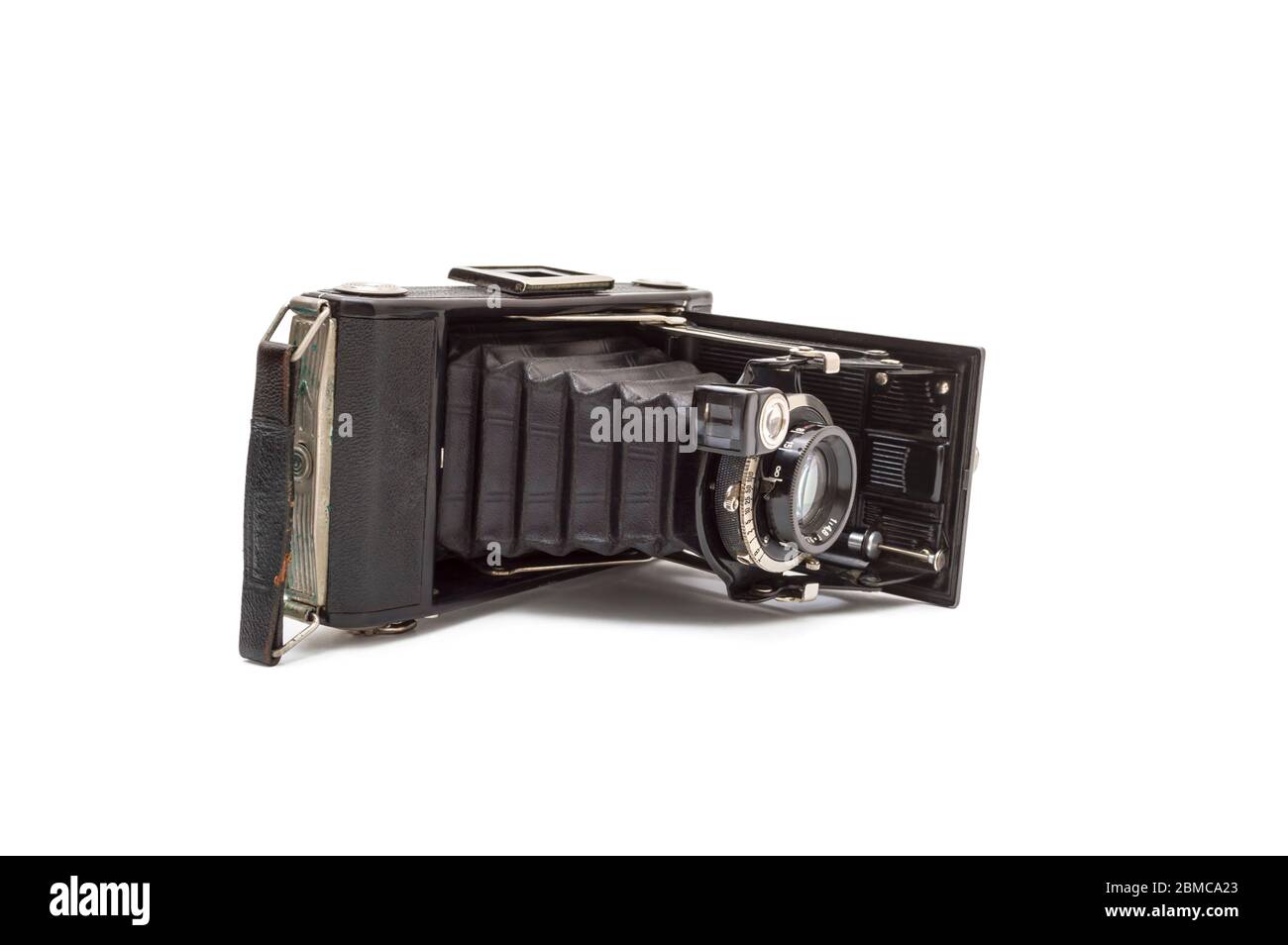 Antique old photo camera isolated on white background Stock Photo