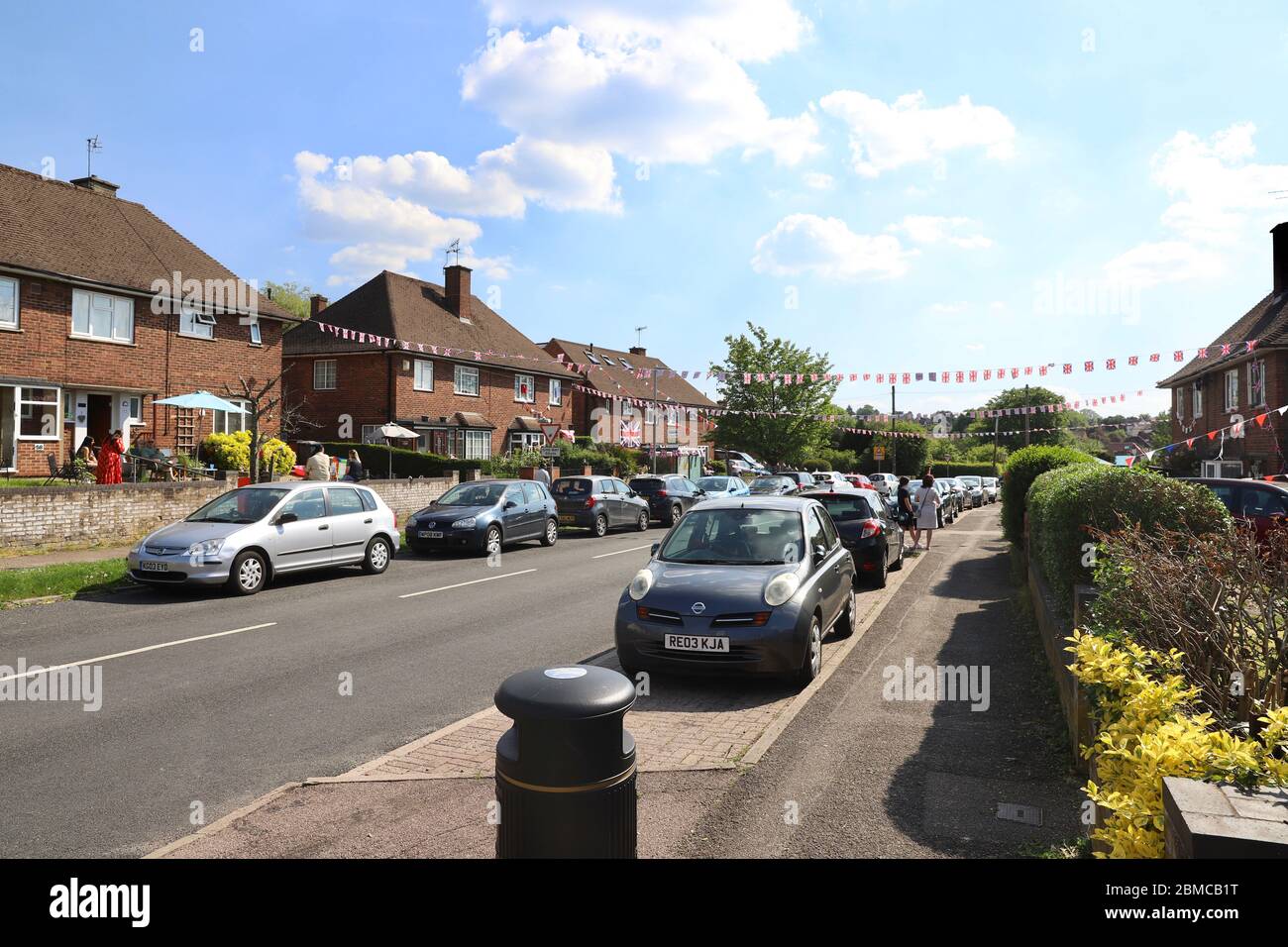 Hertfordshire, UK. 8th May 2020. Residents of Hertfordshire, UK, celebrate VE Day 2020 75th Anniversary with street parties social distancing and isolation, decorating their homes and holding tea parties outside displaying union jack flags, photographs and medals. Credit: Ayeesha Walsh/Alamy Live News Stock Photo