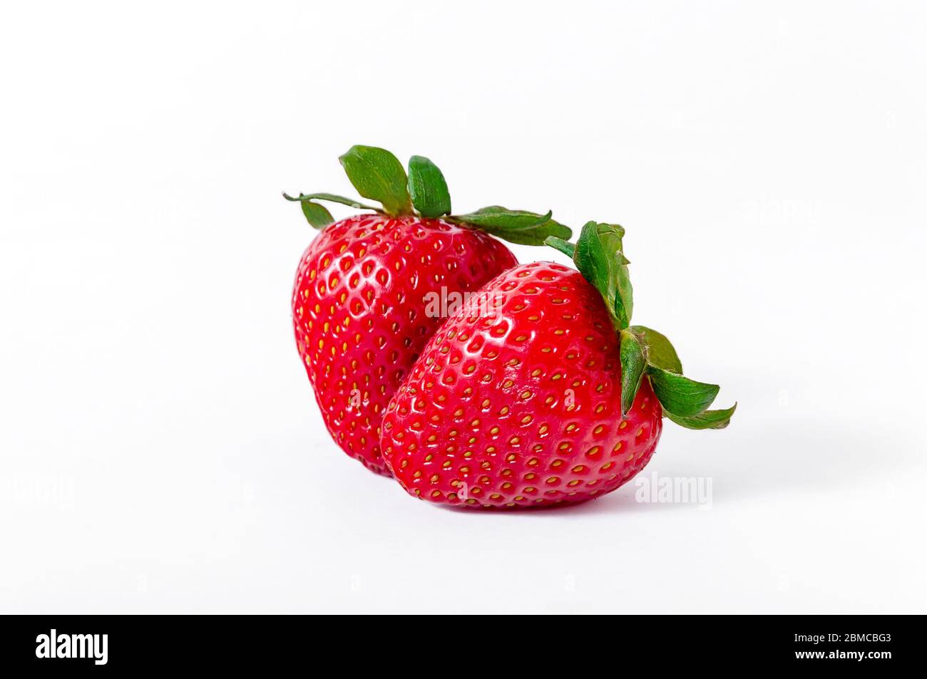 Fresh Ripe Strawberries Isolated on White Background. Stock Photo