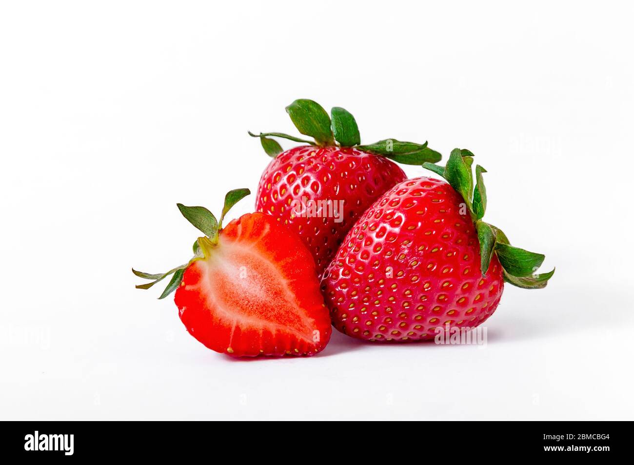 Fresh Ripe Strawberries Isolated on White Background. Stock Photo