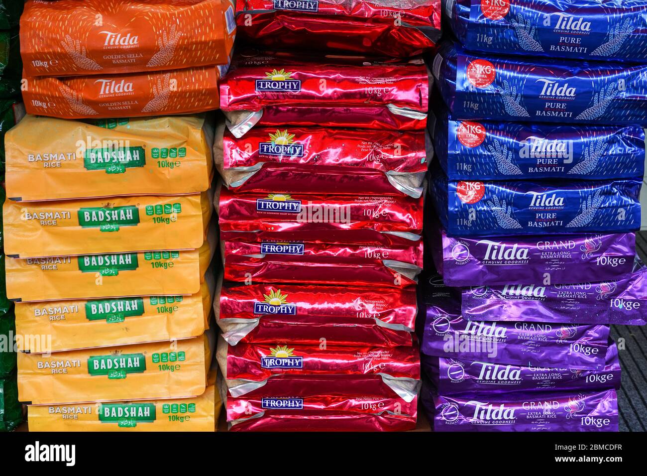 Big bags of basmati rice in grocery shop, London, England United Kingdom UK Stock Photo
