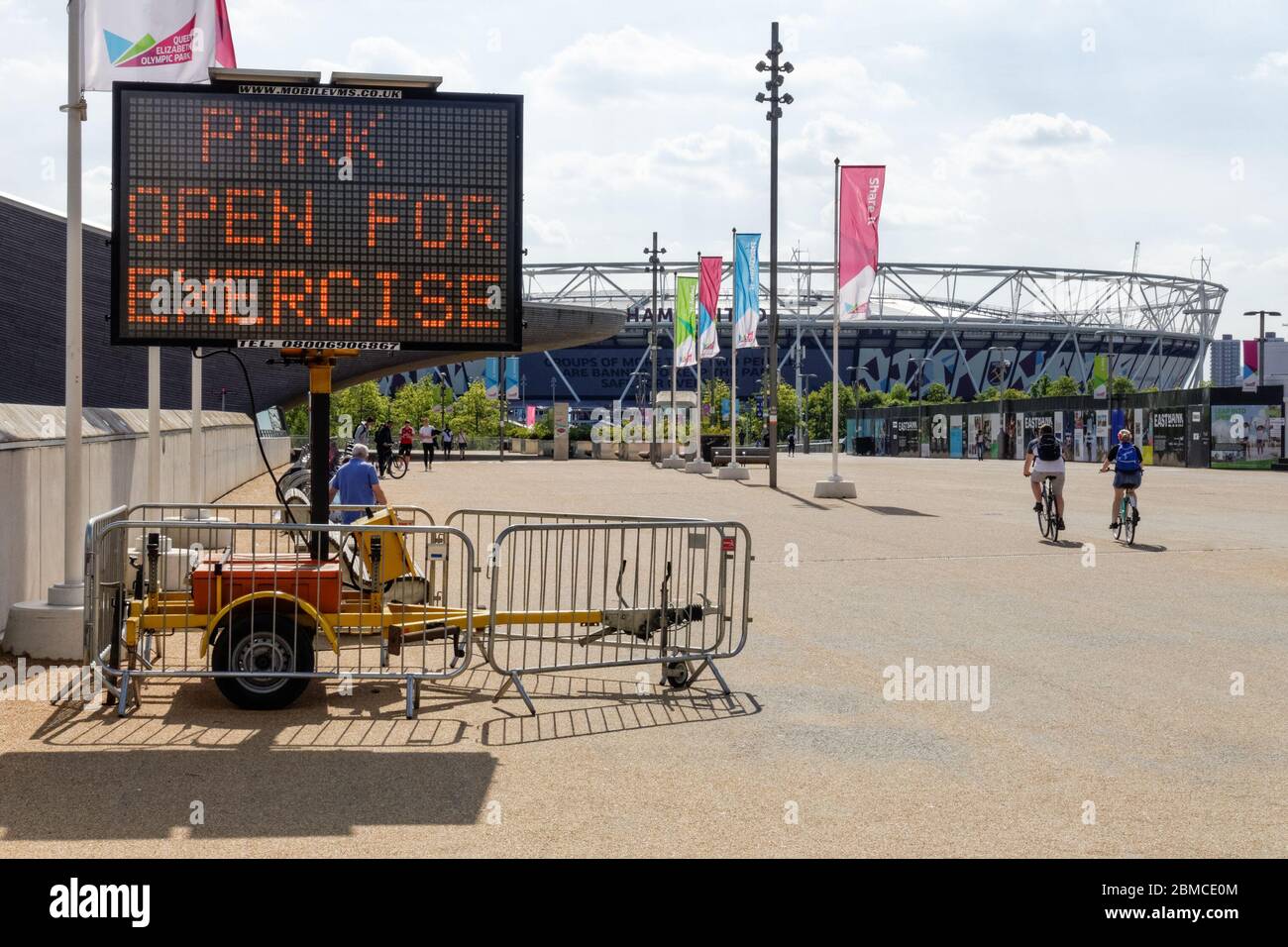 Information board in the Queen Elizabeth Olympic Park reminding people about the coronavirus lockdown rules. London, England United Kingdom UK Stock Photo