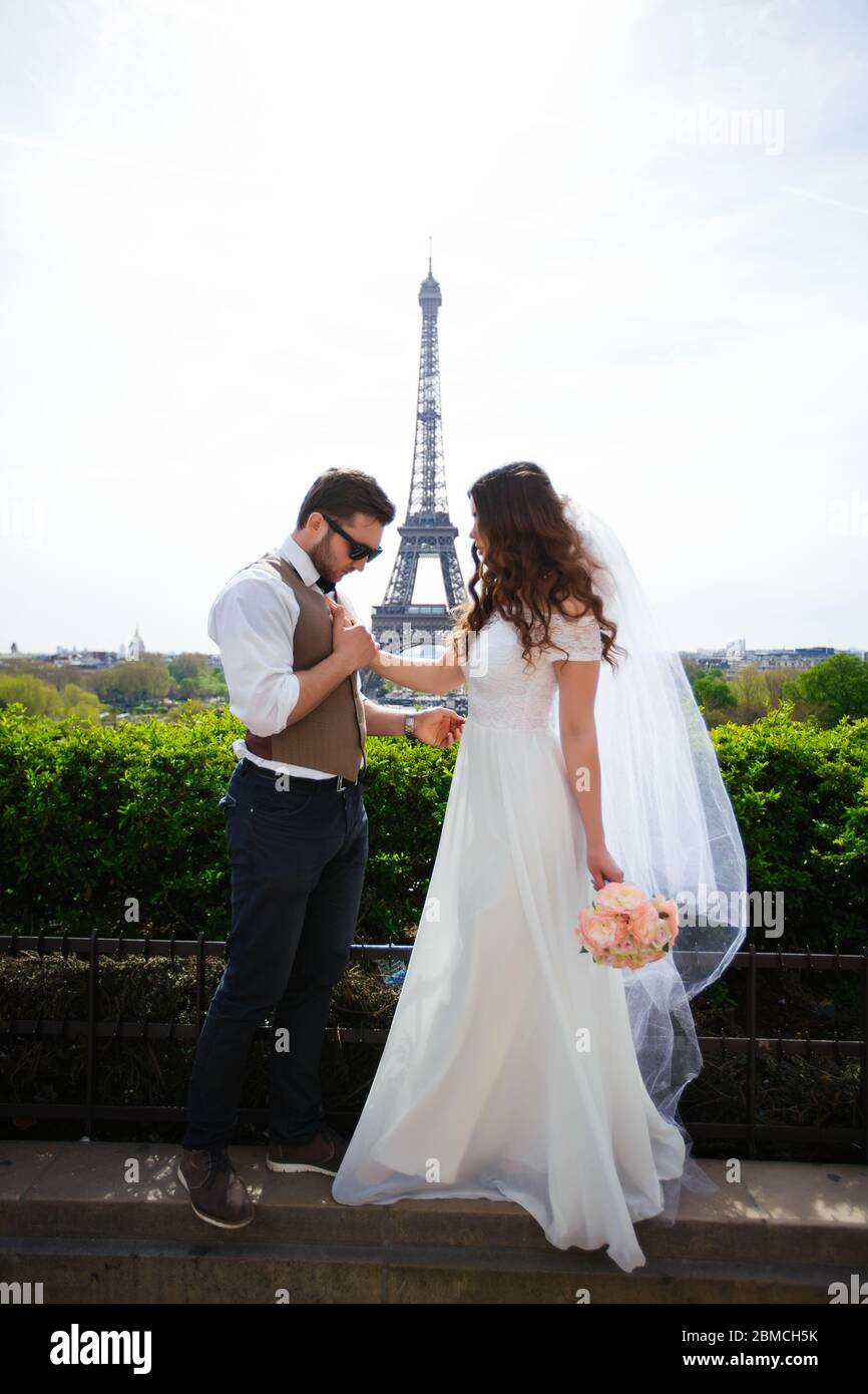 Happy bride and groom enjoying their wedding in Paris. Stock Photo
