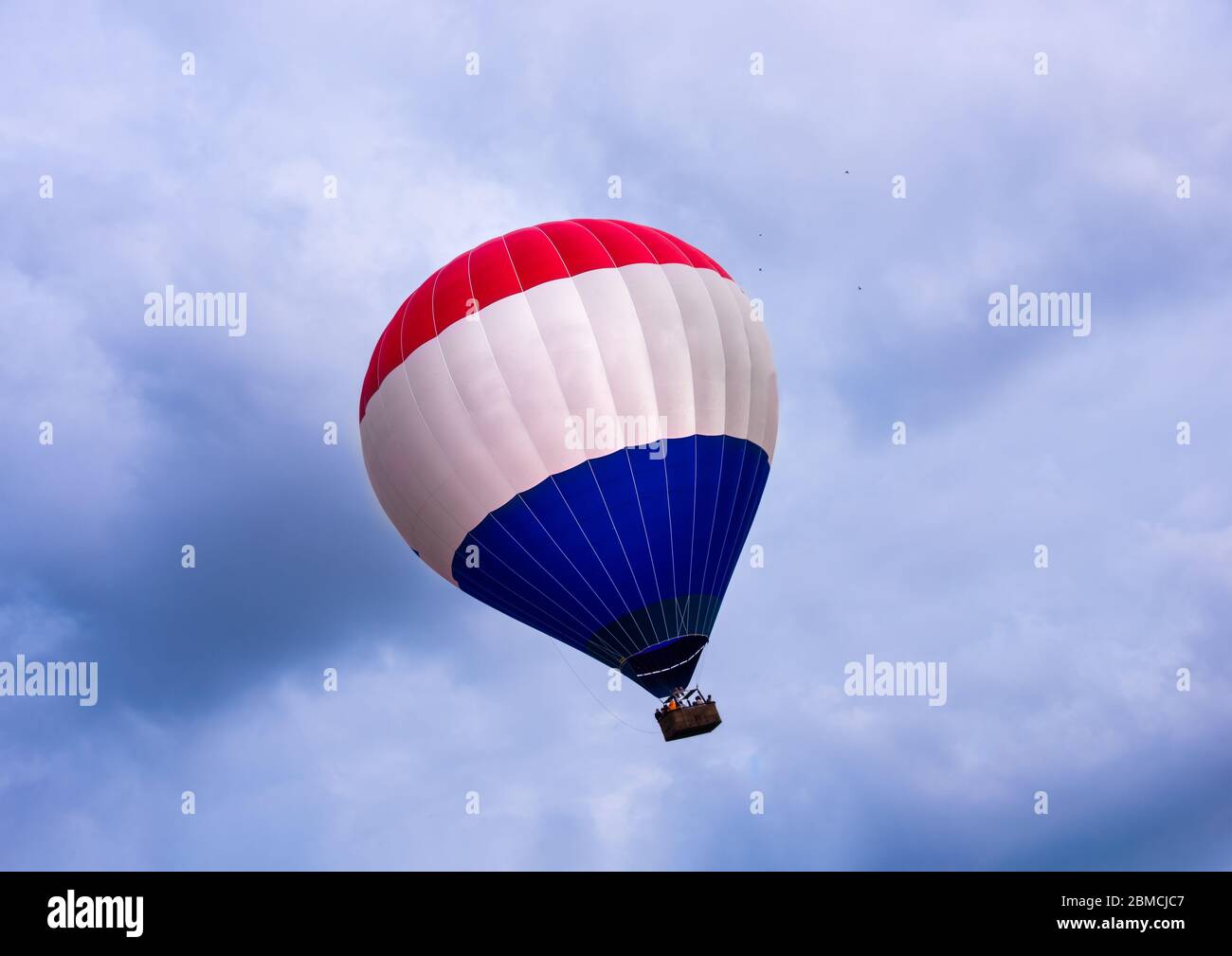 Colorful hot air balloon flying in the sky Stock Photo - Alamy