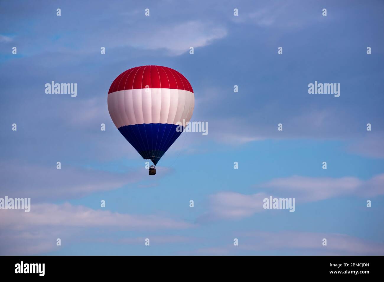 Colorful hot air balloon flying in the sky Stock Photo - Alamy
