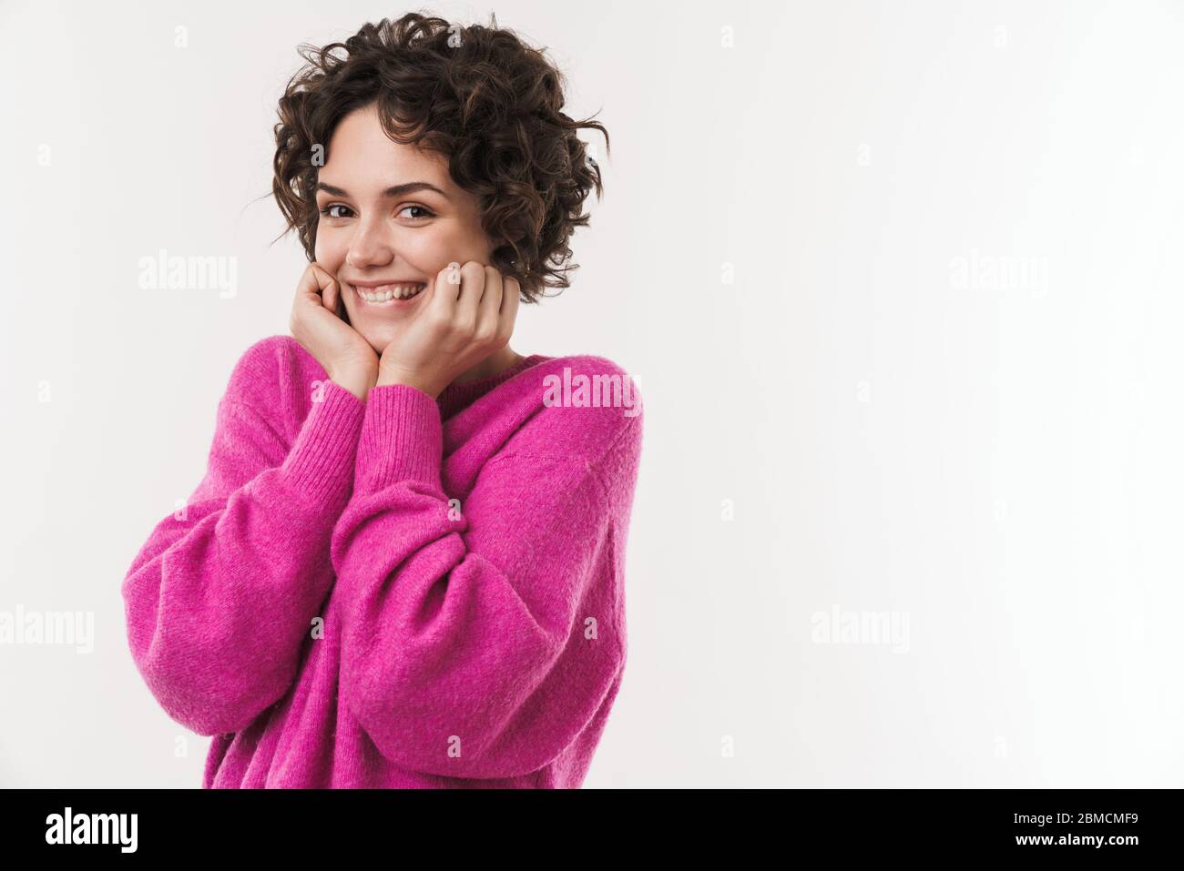 Image of happy caucasian woman smiling and looking at camera isolated ...