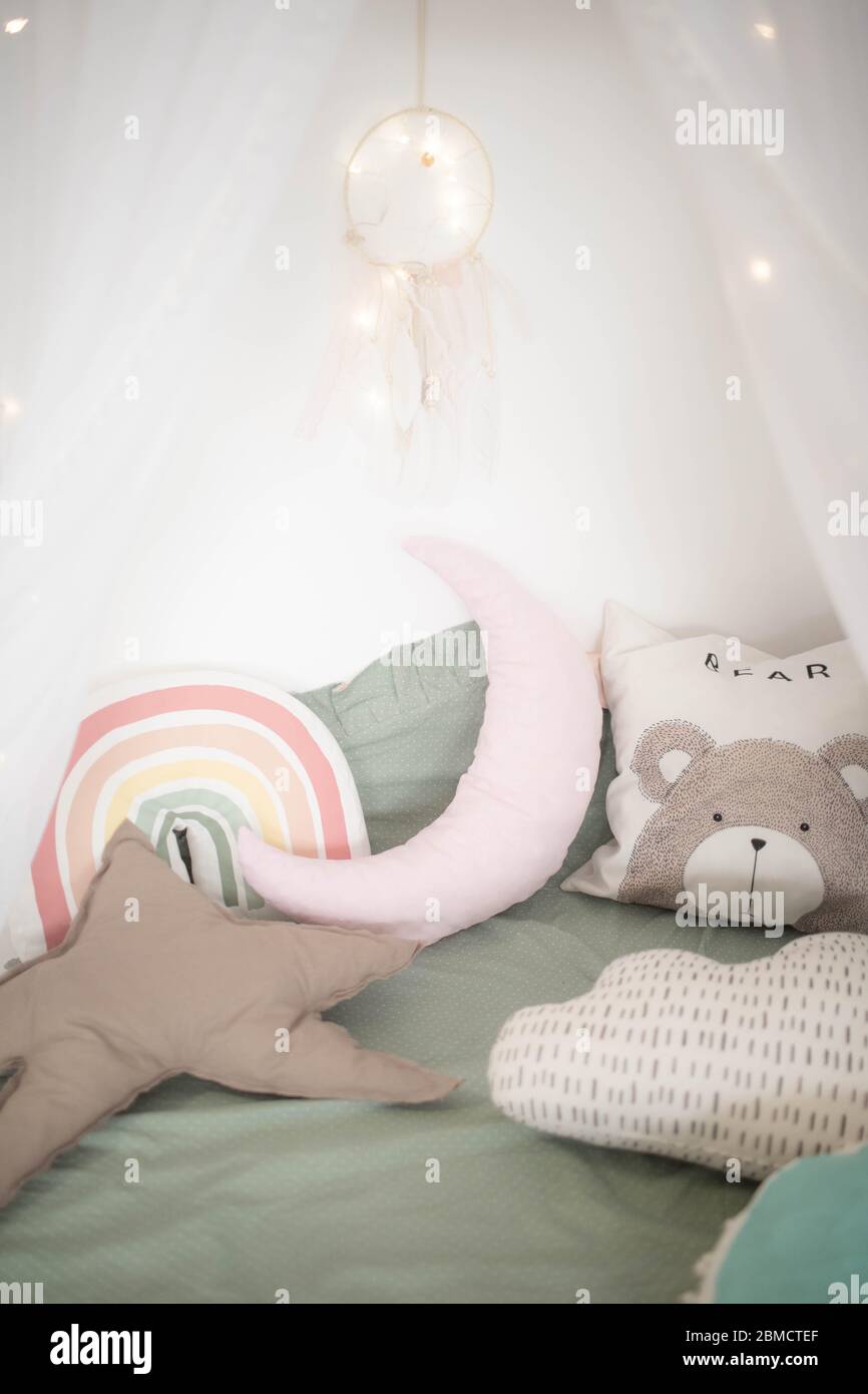 Small square pillows on the sofa. Close up. Stock Photo
