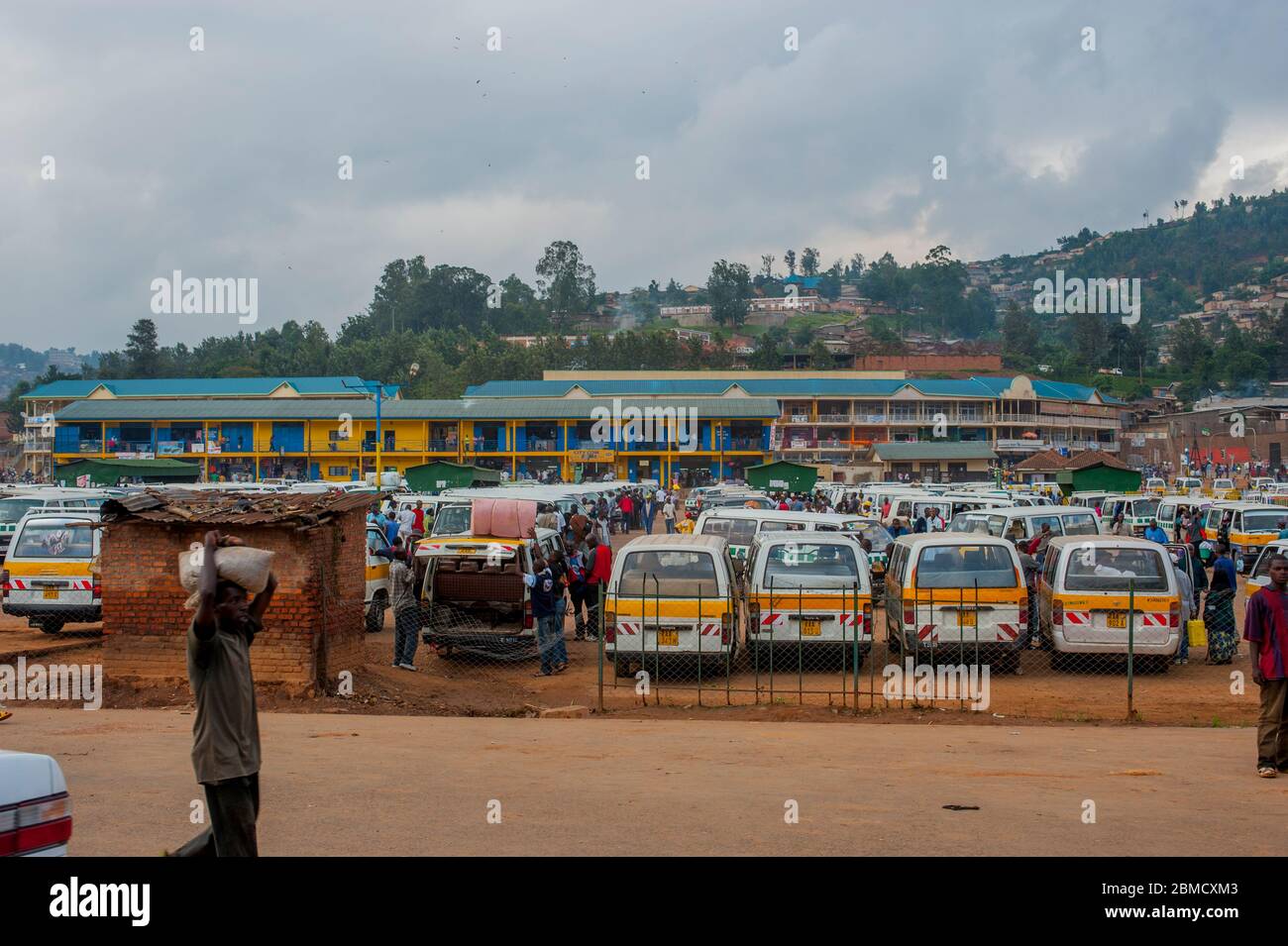 Street scene with a bus terminal in Kigali, the capital and largest city of Rwanda. Stock Photo