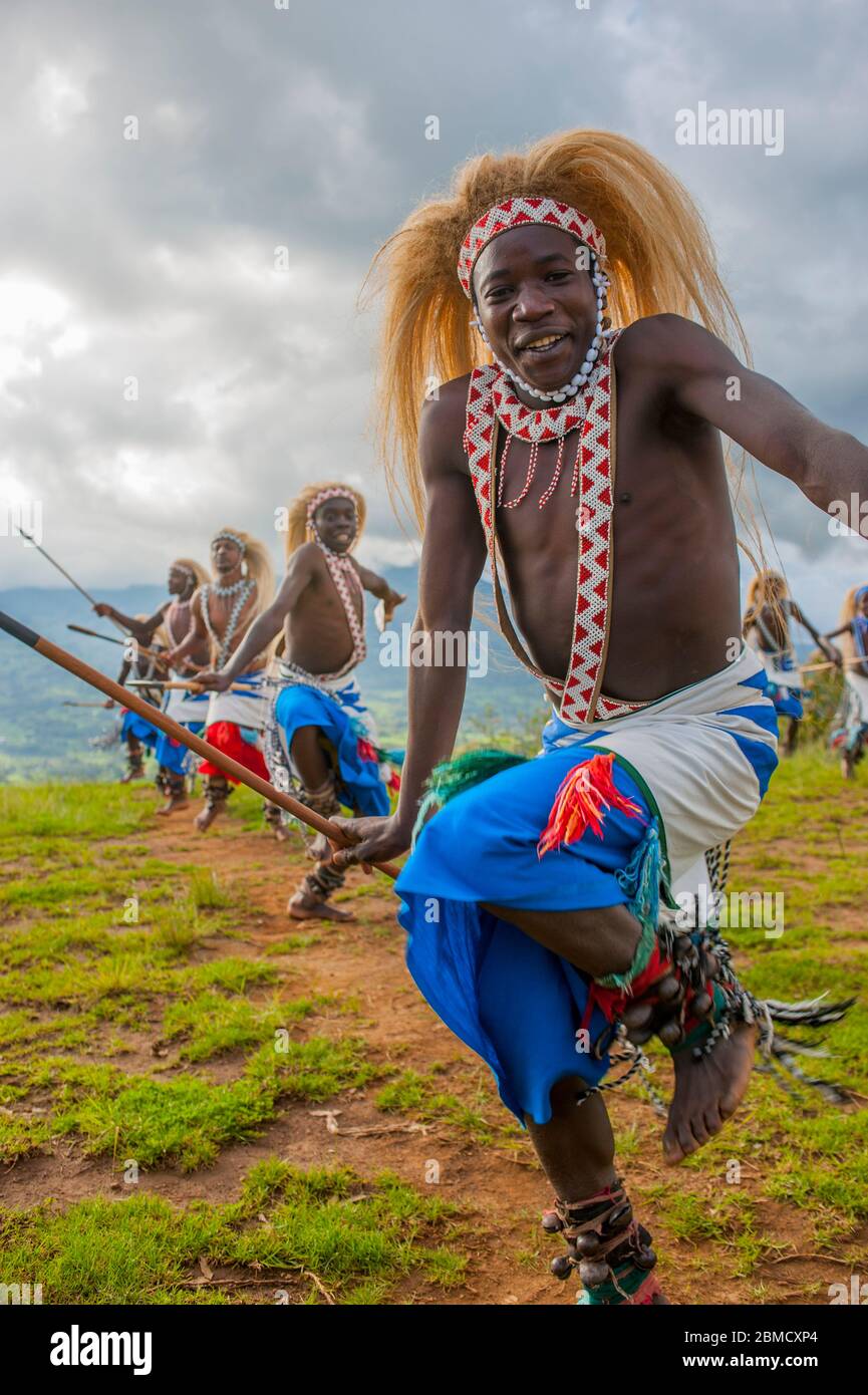 A traditional dance is performed in a small village in the Virunga area of Rwanda. Stock Photo