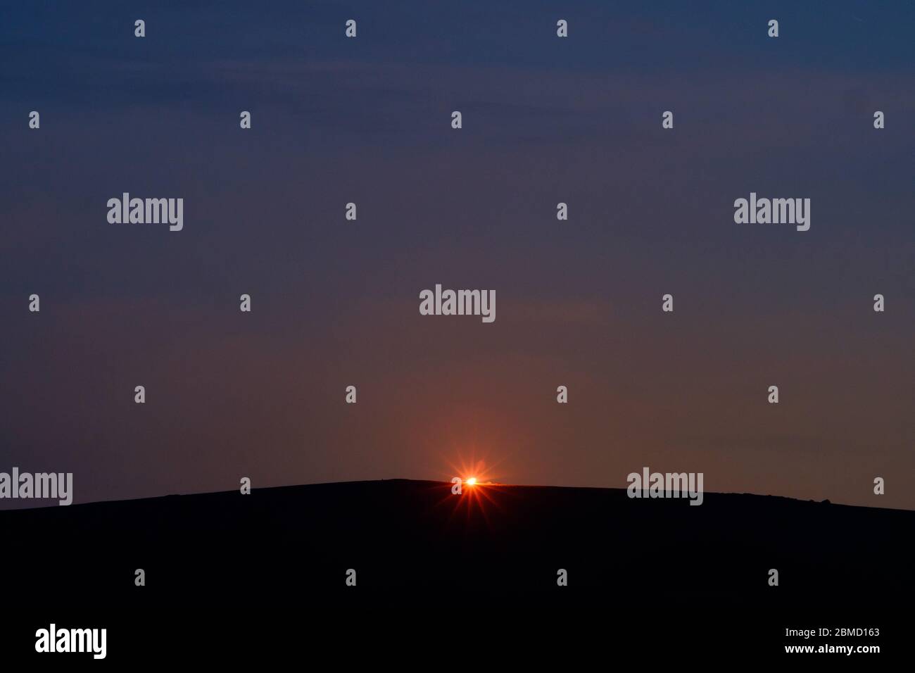 Firle, East Sussex, UK. 8th May, 2020. A bonfire is lit on top of the South Downs at Firle Beacon to clelebrate the 75th anbniversary of VE day. A series of flares were also sent into the air. Credit: Peter Cripps/Alamy Live News Stock Photo