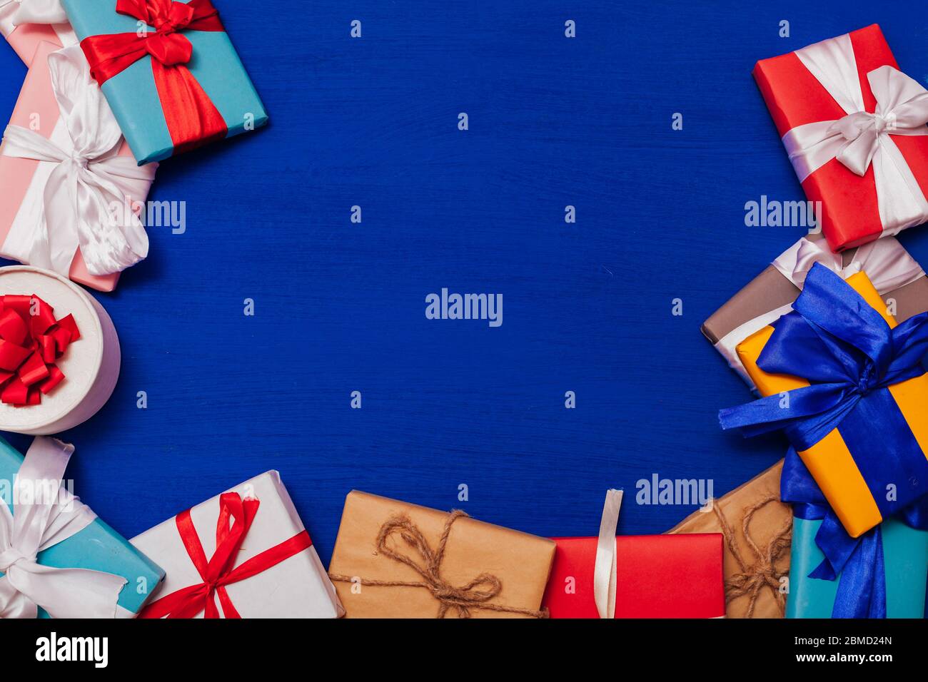 Multi-colored gifts on the birthday party background for inscriptions ...