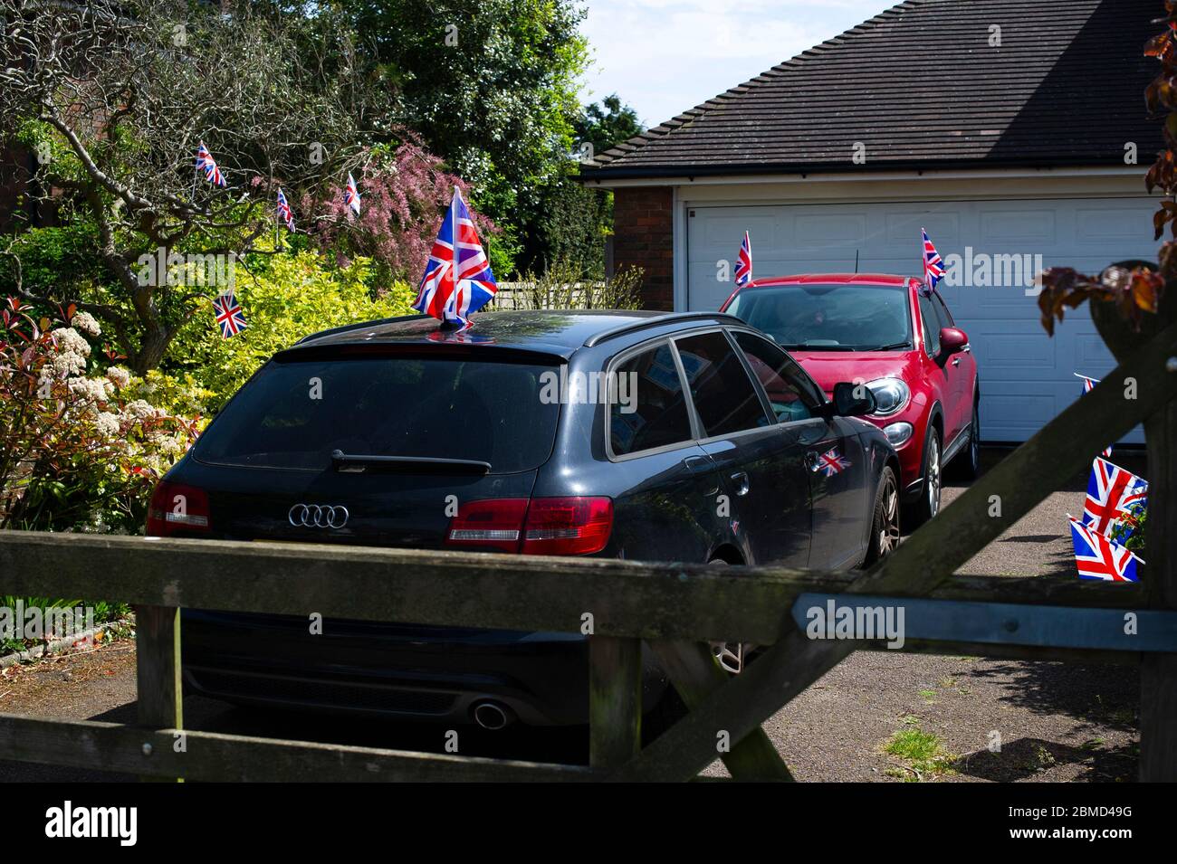 Union Jack flag on cars in the driveway Stock Photo Alamy