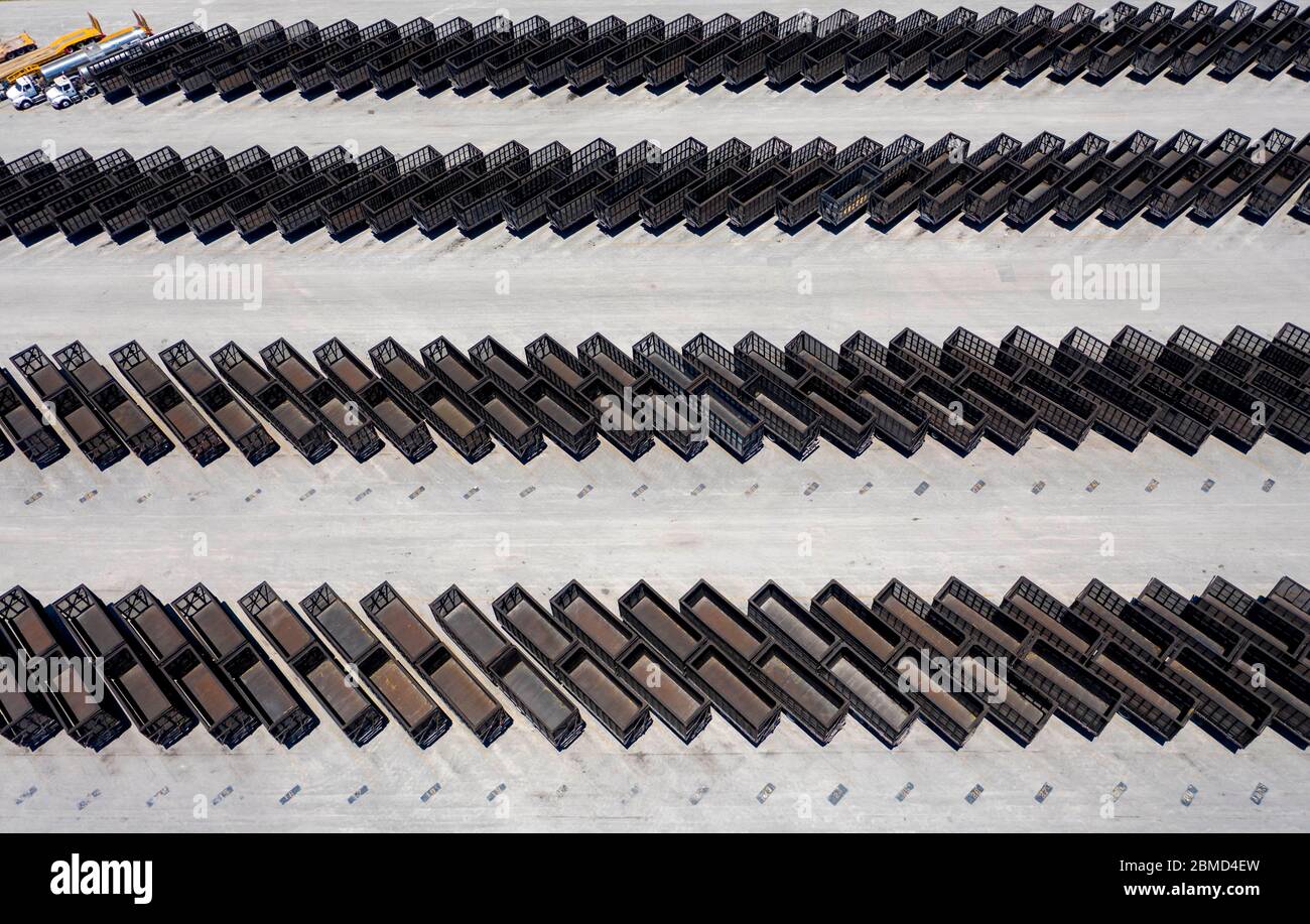 Belle Glade, Florida, USA. 8th May, 2020. Rows of empty haulers that