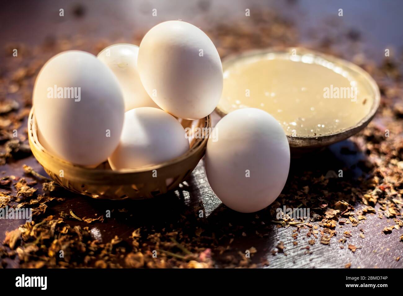 Spot reduction face mask on the shiny brown surface consisting of some