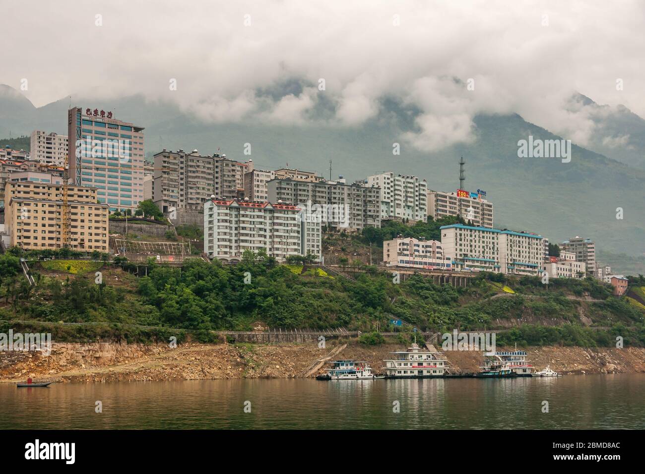 Xinling, China - May 6, 2010: Xiling gorge on Yangtze River. Group of ...