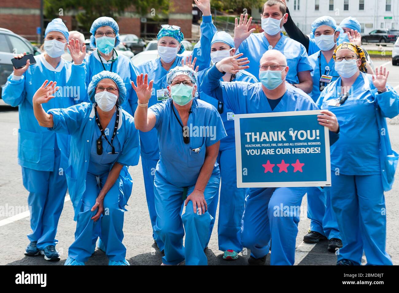 Healthcare workers at Emerson Hospital posing before the Appreciation Parade organized fo them by the Concord Police. Stock Photo