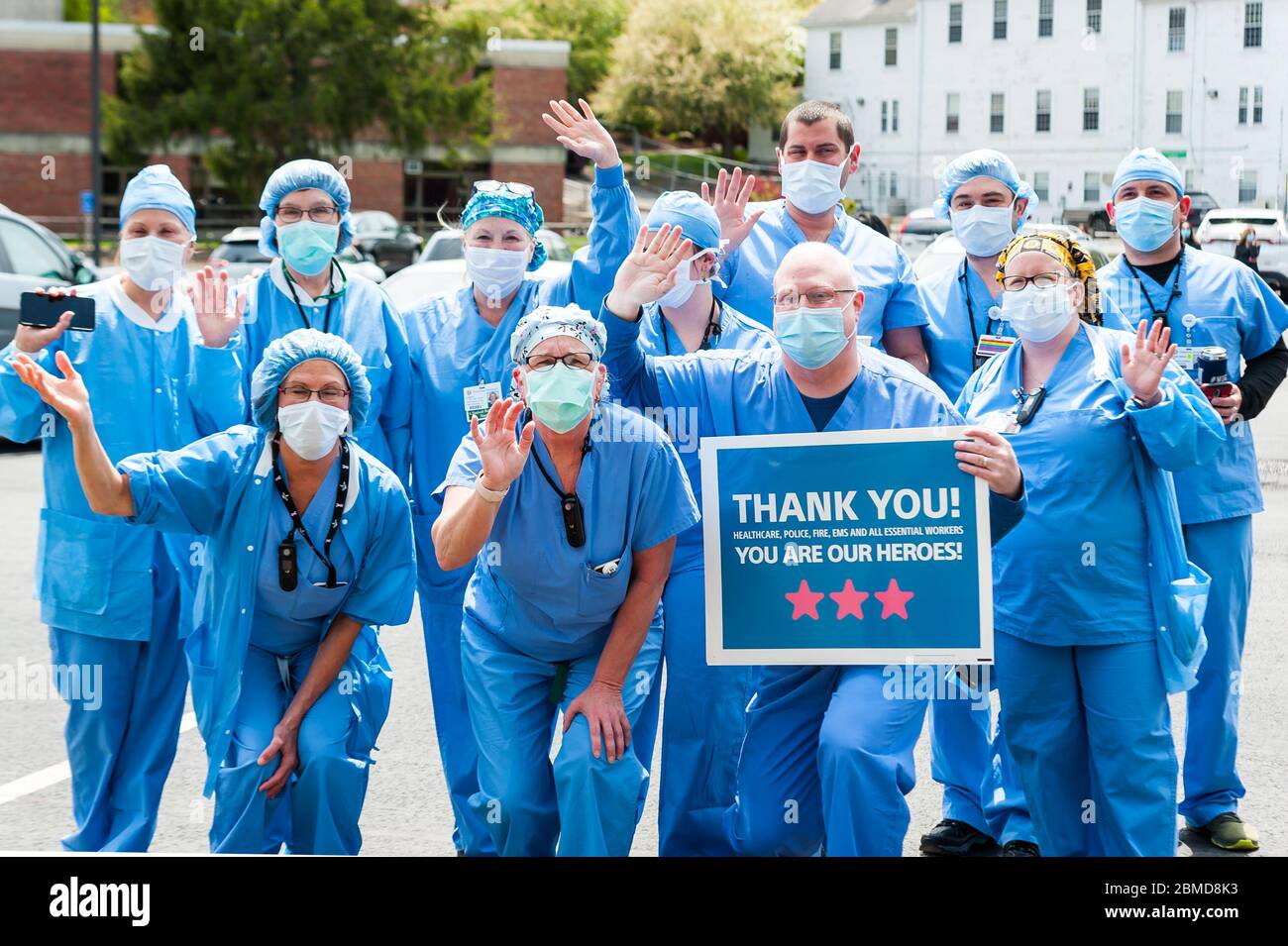 Healthcare workers at Emerson Hospital posing before the Appreciation Parade organized fo them by the Concord Police. Stock Photo