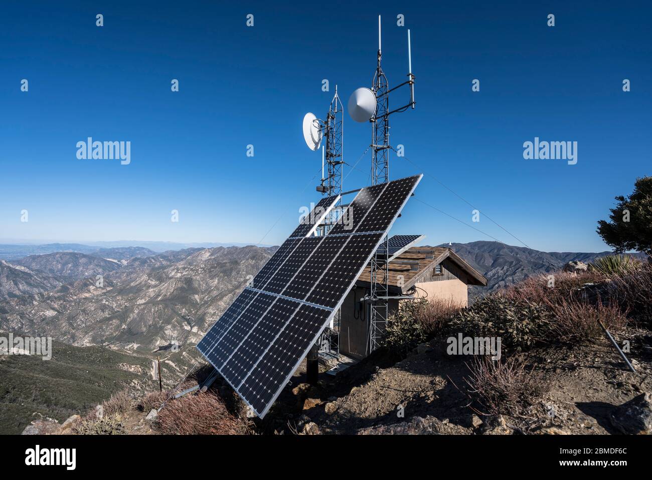 Solar communication towers on top of Josephine Peak in the San Gabriel Mountains and Angeles National Forest in Southern California. Stock Photo