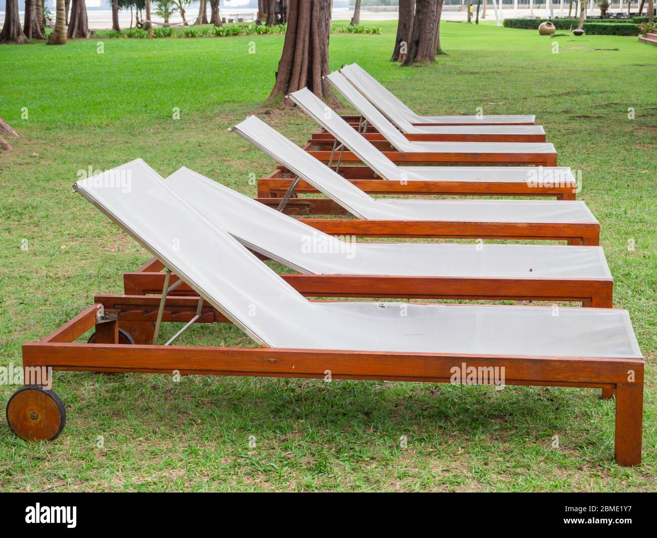 White cradle in the green lawn Stock Photo Alamy