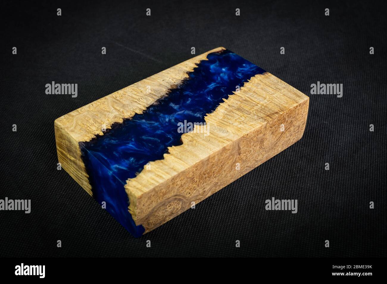 Casting Blue Epoxy Resin With Nature Burl Maple Wood Cube On Black Background Stock Photo Alamy