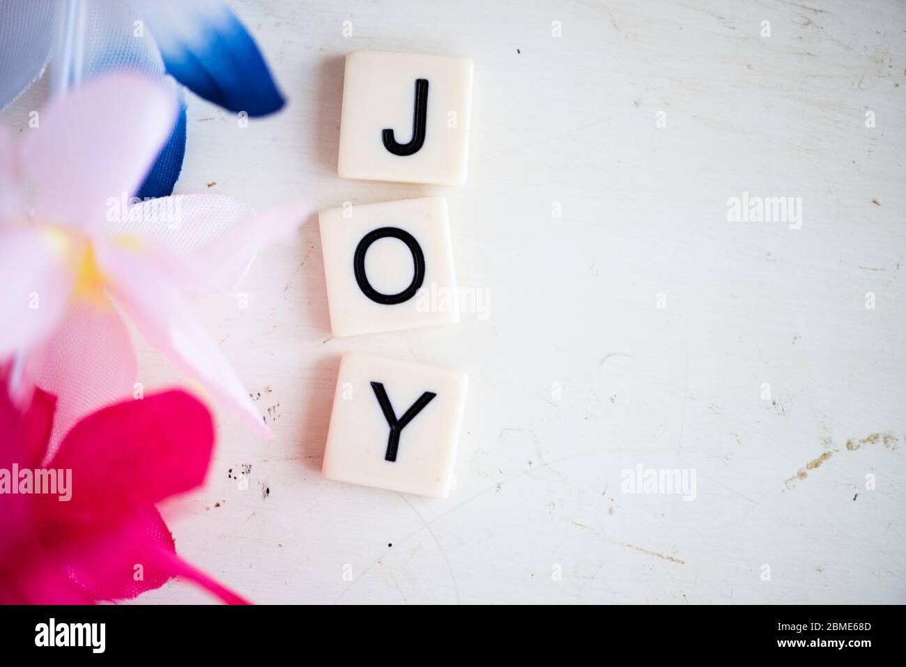 Joy in block letters Stock Photo