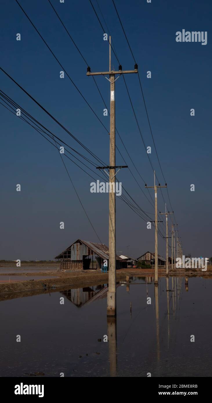 Power poles and power lines in diminishing perspective Stock Photo
