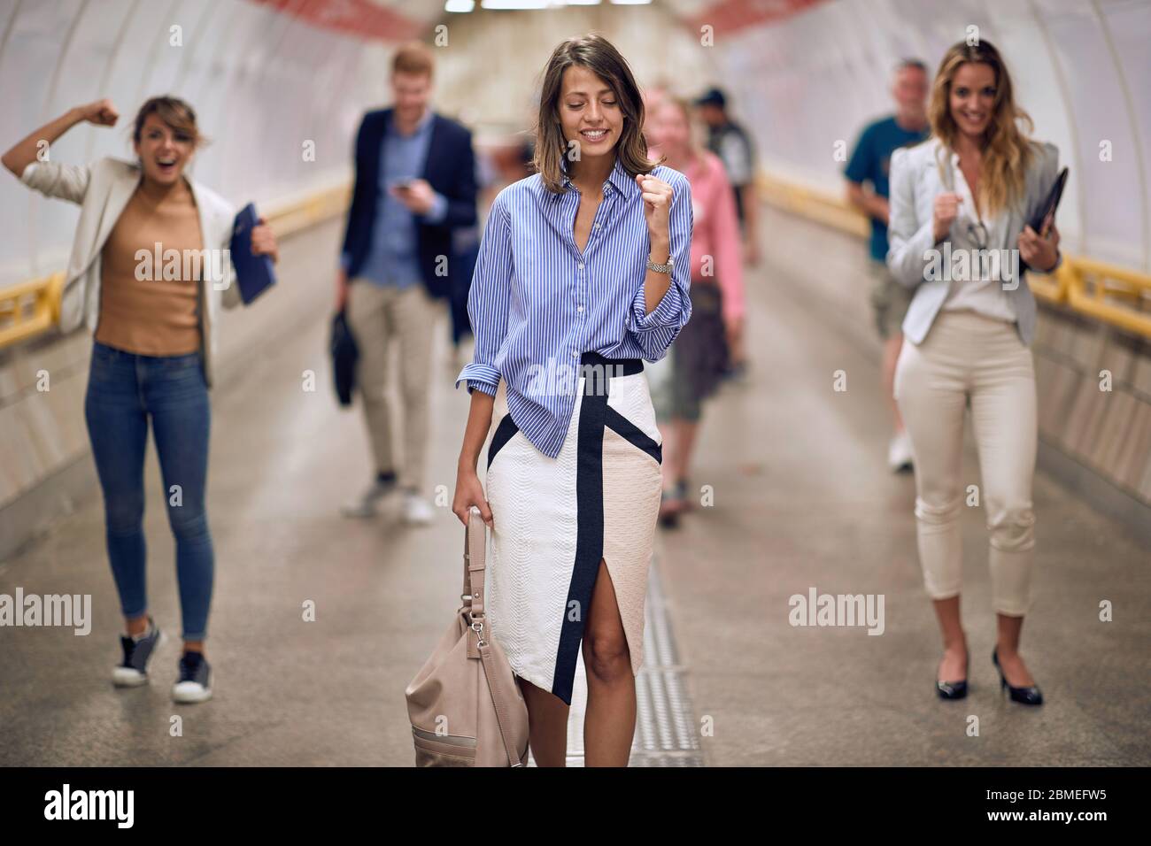 Successful business people In the subway station.Young Business People Walking Commuter Travel Motion City Concept Stock Photo