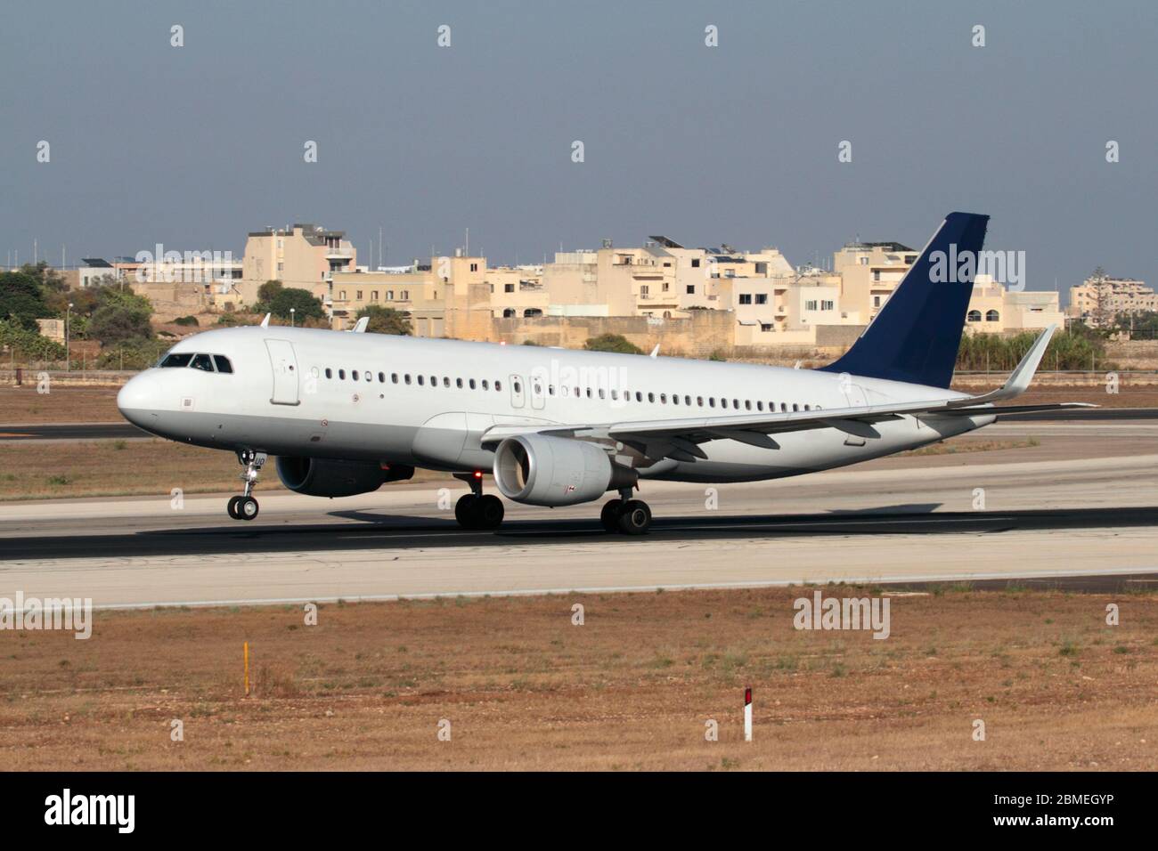 Airbus A320 airliner jet plane aircraft airplane taking off takeoff runway modern air travel civil aviation Stock Photo