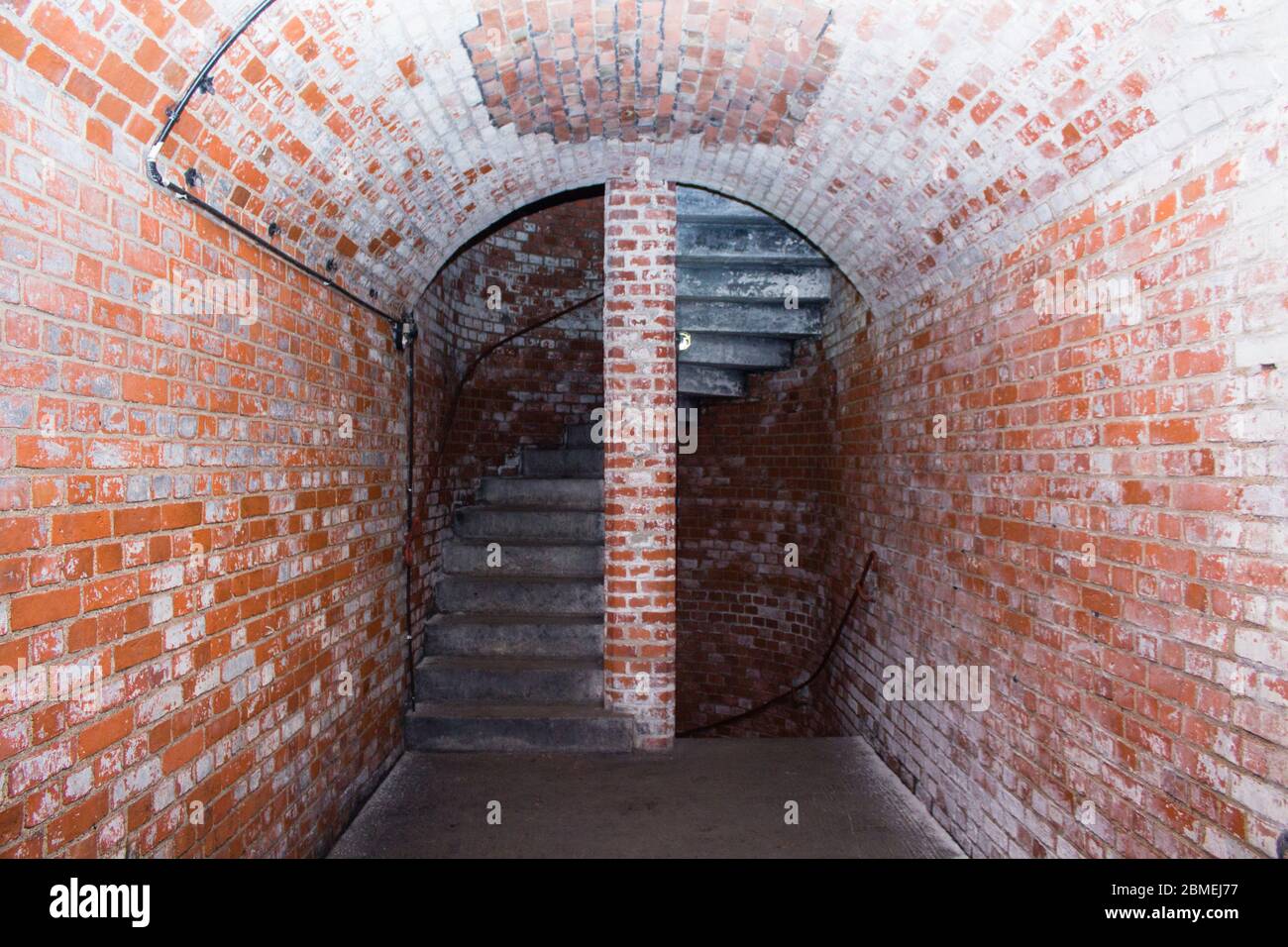 A spiral staircase from the red bricks Stock Photo