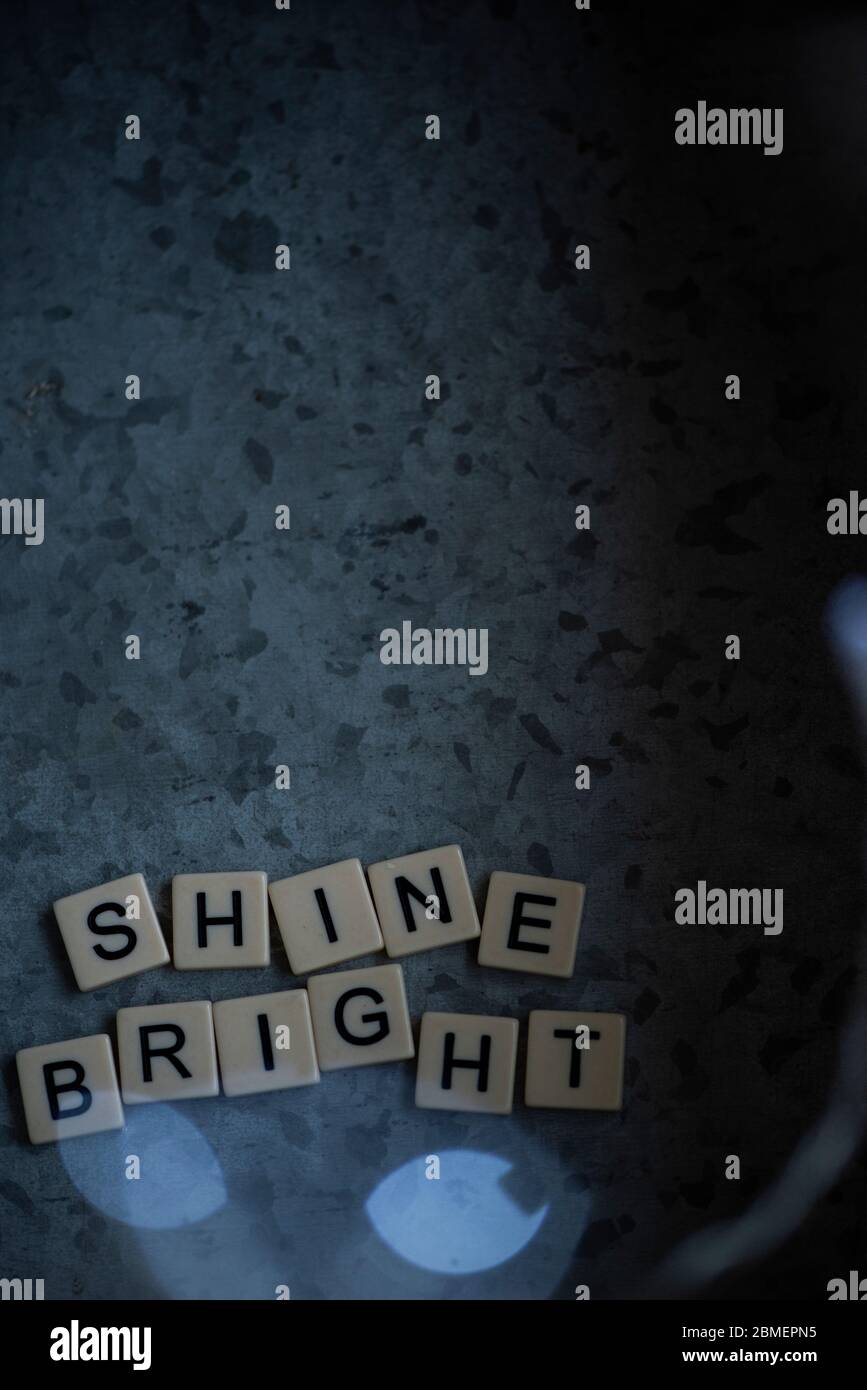 Shine bright in block letters Stock Photo