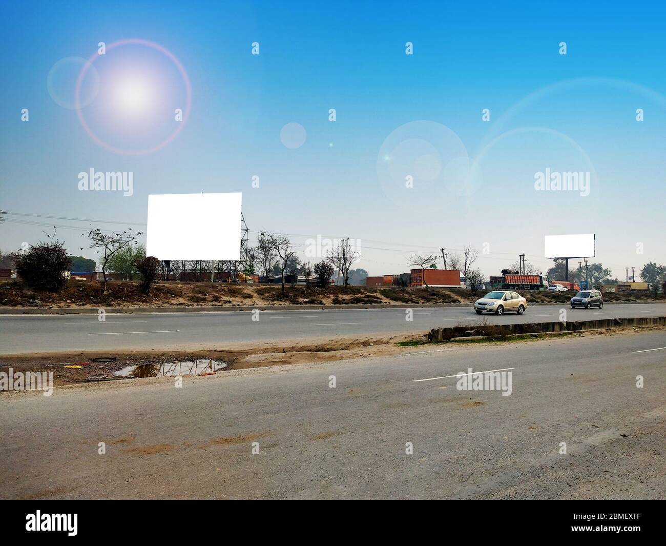 Blank white billboard advertisement space available for promotion Stock Photo
