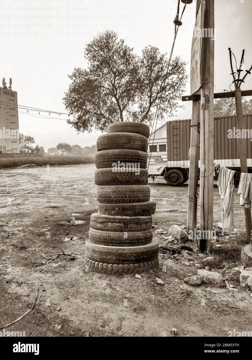 Stacked tyre at road side tyre change or service shop Stock Photo