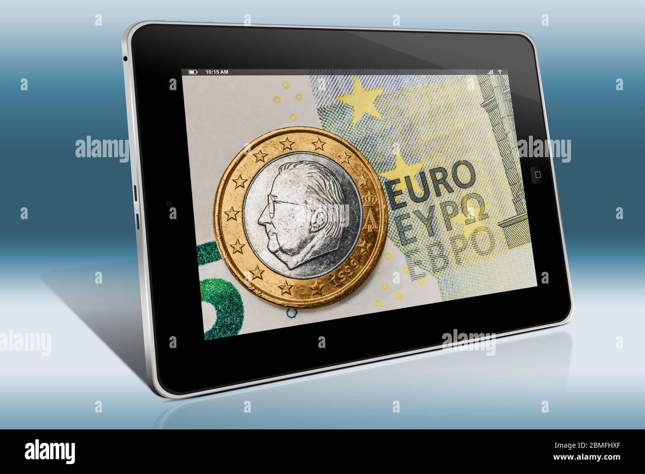 a 1 euro coin from Belgium on a 5 euro banknote, view on a Tablet PC Stock Photo
