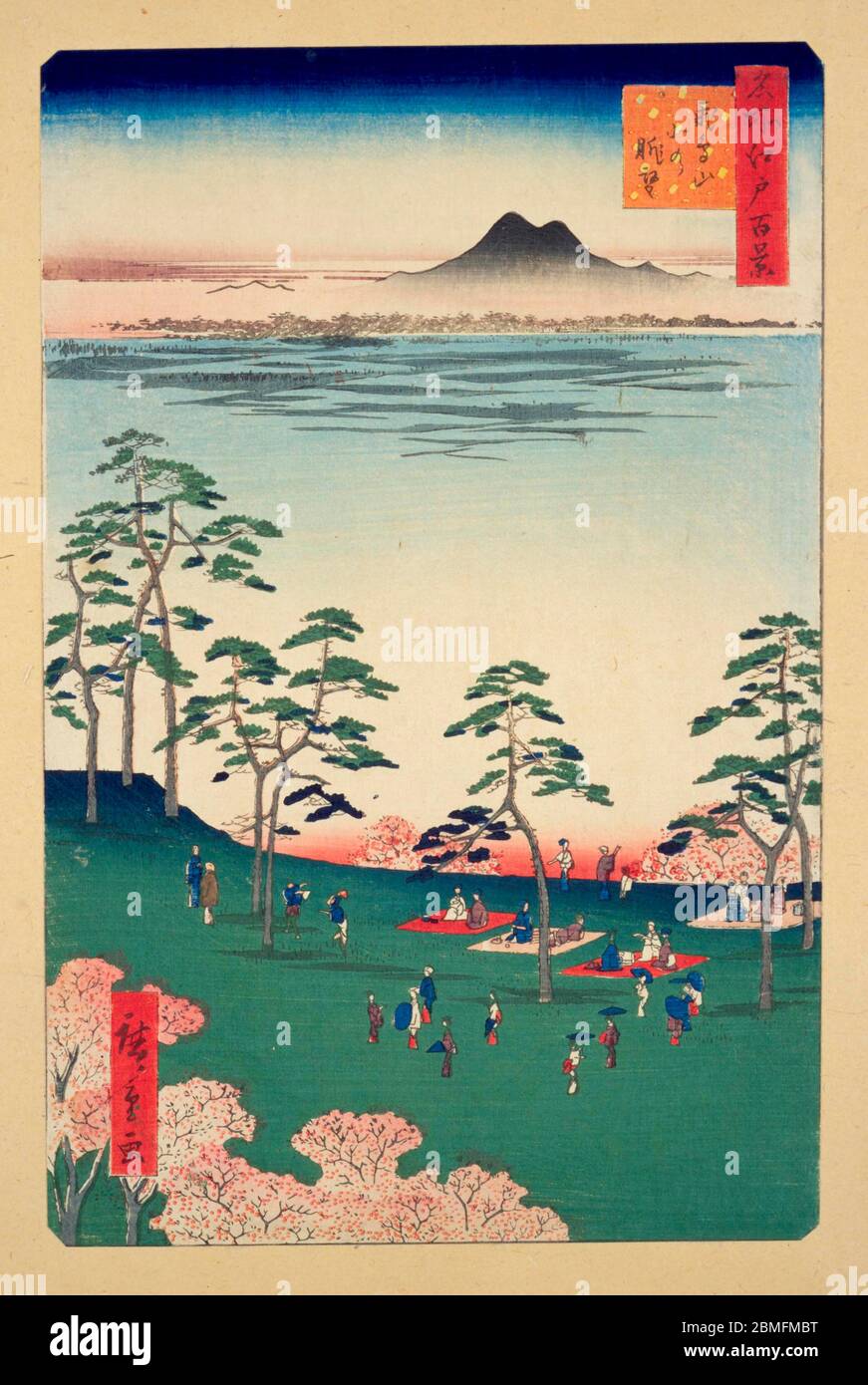 [ 1850s Japan - Cherry Blossom Viewing ] —   People enjoying hanami (cherry blossom viewing) at Asukayama Park in Edo (current Tokyo), 1856 (Ansei 3). In the distance, Mount Tsukuba can be seen.  This woodblock print is image 17 in One Hundred Famous Views of Edo (名所江戸百景, Meisho Edo Hyakkei), a series created by ukiyoe artist Utagawa Hiroshige (歌川広重, 1797–1858).  It is one of 42 spring scenes in the series.  Title: View to the North from Asukayama (飛鳥山北の眺望, Asukayama kita no chobo)  19th century vintage Ukiyoe woodblock print. Stock Photo