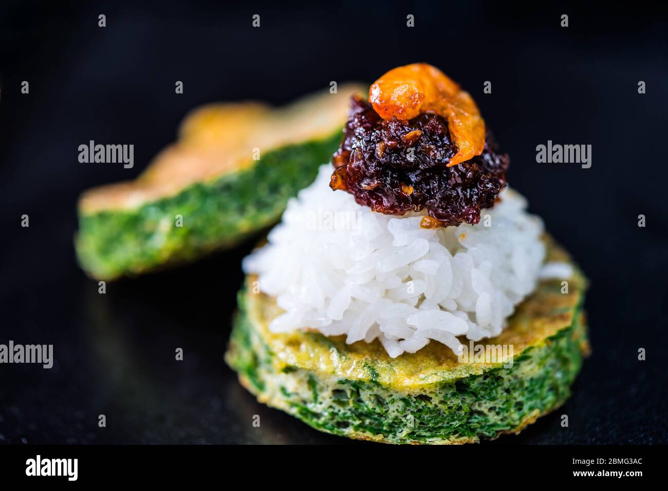 Spicy chili paste with steamed rice and fried Egg with Climbing Wattle