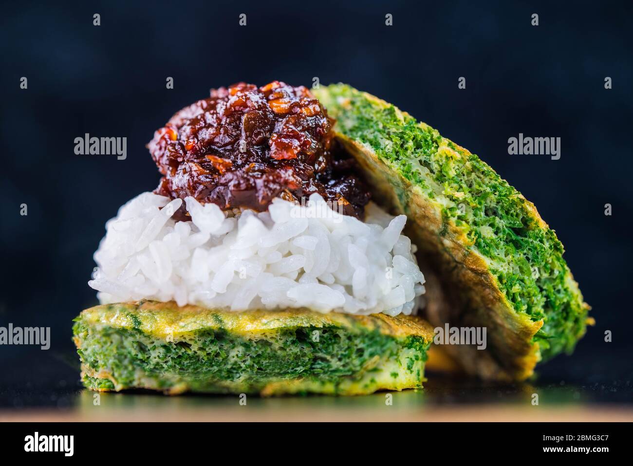 Spicy chili paste with steamed rice and fried Egg with Climbing Wattle