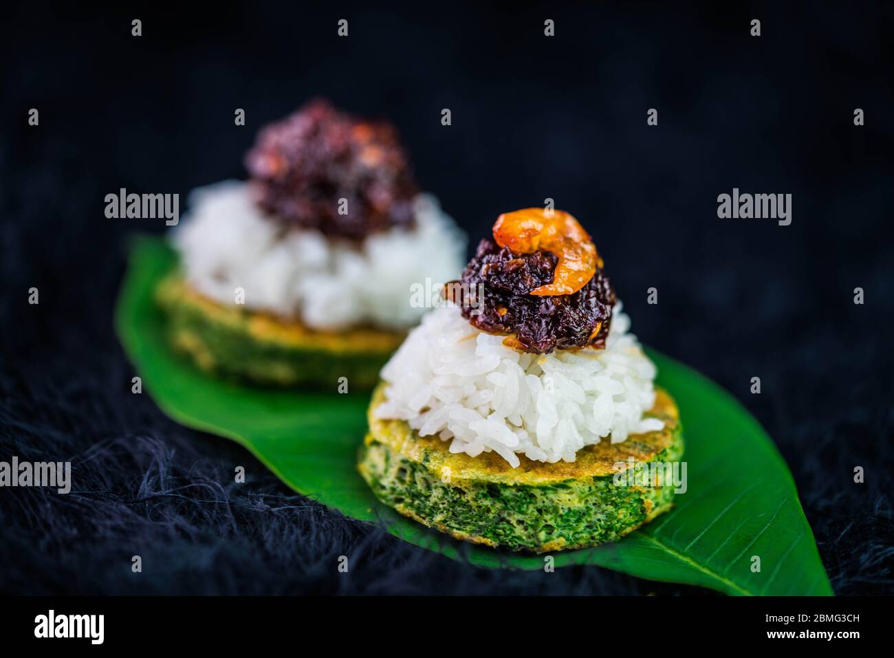 Spicy chili paste with steamed rice and fried Egg with Climbing Wattle