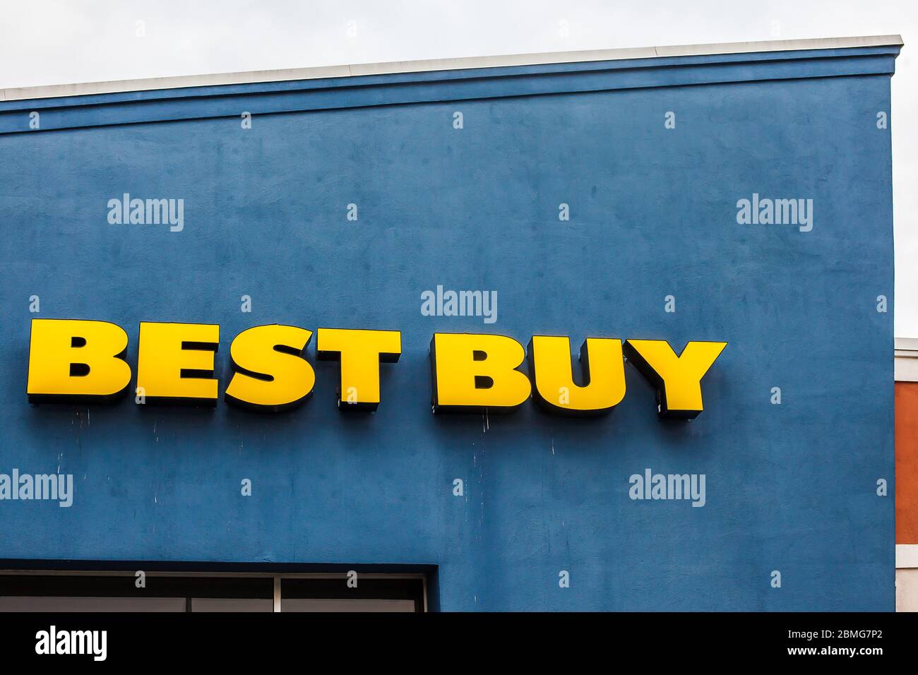 NORWALK, CT, USA - MAY 8, 2020:  Sign on Best Buy storefront on blue wall Stock Photo