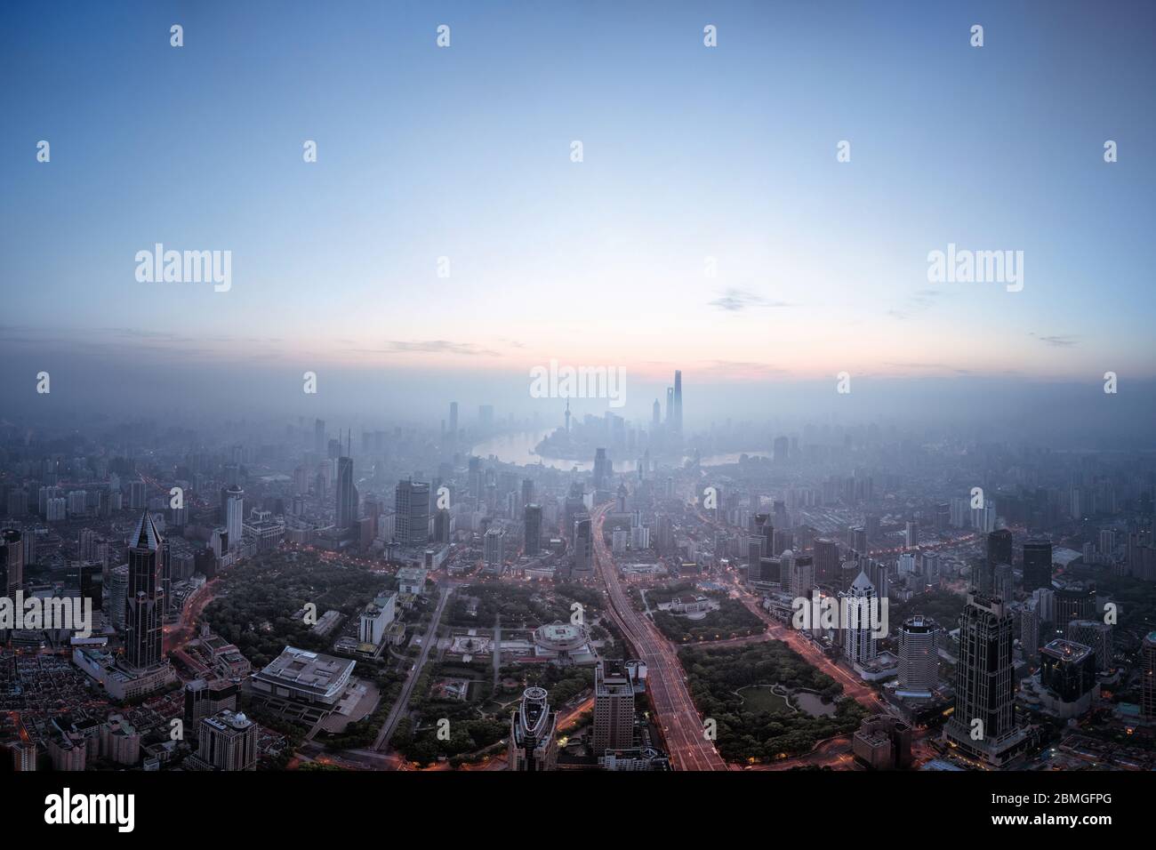 aerial view of shanghai city in foggy dawn Stock Photo - Alamy
