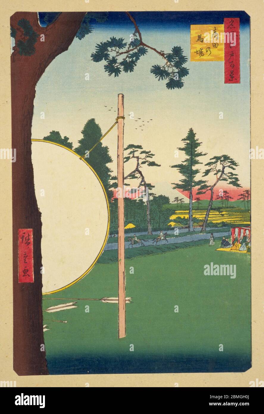 [ 1850s Japan - Practicing Archery ] —   Samurai practicing archery at the Takatanobaba Riding Grounds in Edo (current Tokyo), 1857 (Ansei 4).  This woodblock print is image 115 in One Hundred Famous Views of Edo (名所江戸百景, Meisho Edo Hyakkei), a series created by ukiyoe artist Utagawa Hiroshige (歌川広重, 1797–1858).  It is one of 20 winter scenes in the series.  Title: The Takata Riding Grounds (高田の馬場, Takada no baba)  19th century vintage Ukiyoe woodblock print. Stock Photo