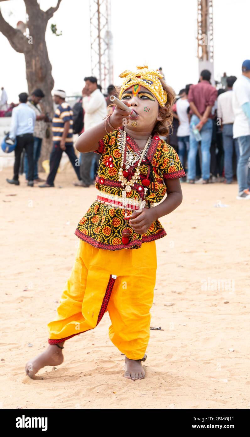 Cute Indian kid in lord krishna makeup and dress at Pushkar Camel ...