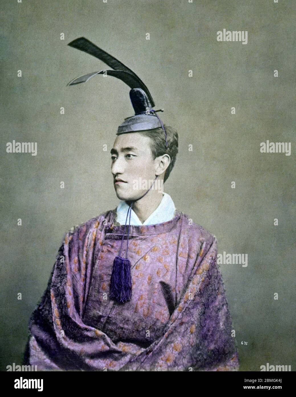 [ 1870s Japan - Japanese Man in Court Costume ] —   Man in court costume wearing a kanmuri hat (冠), ca 1877 (Meiji 10).  19th century vintage albumen photograph. Stock Photo