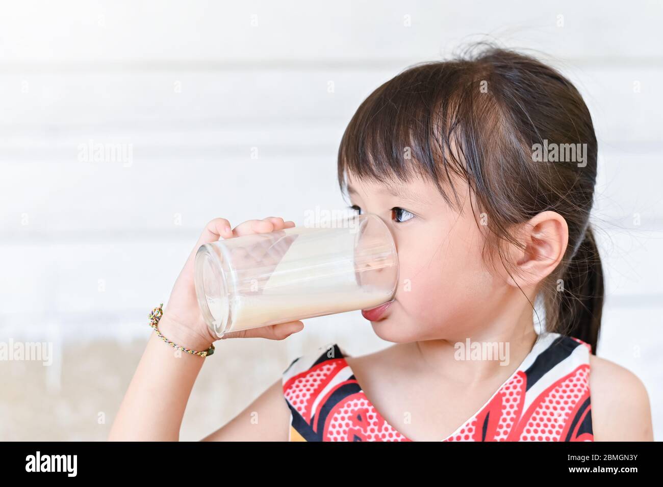 Portrait of a Cute Toddler Drinking Milk from the Bottle, One Year Old Food  Concept Stock Image - Image of home, milk: 144620017