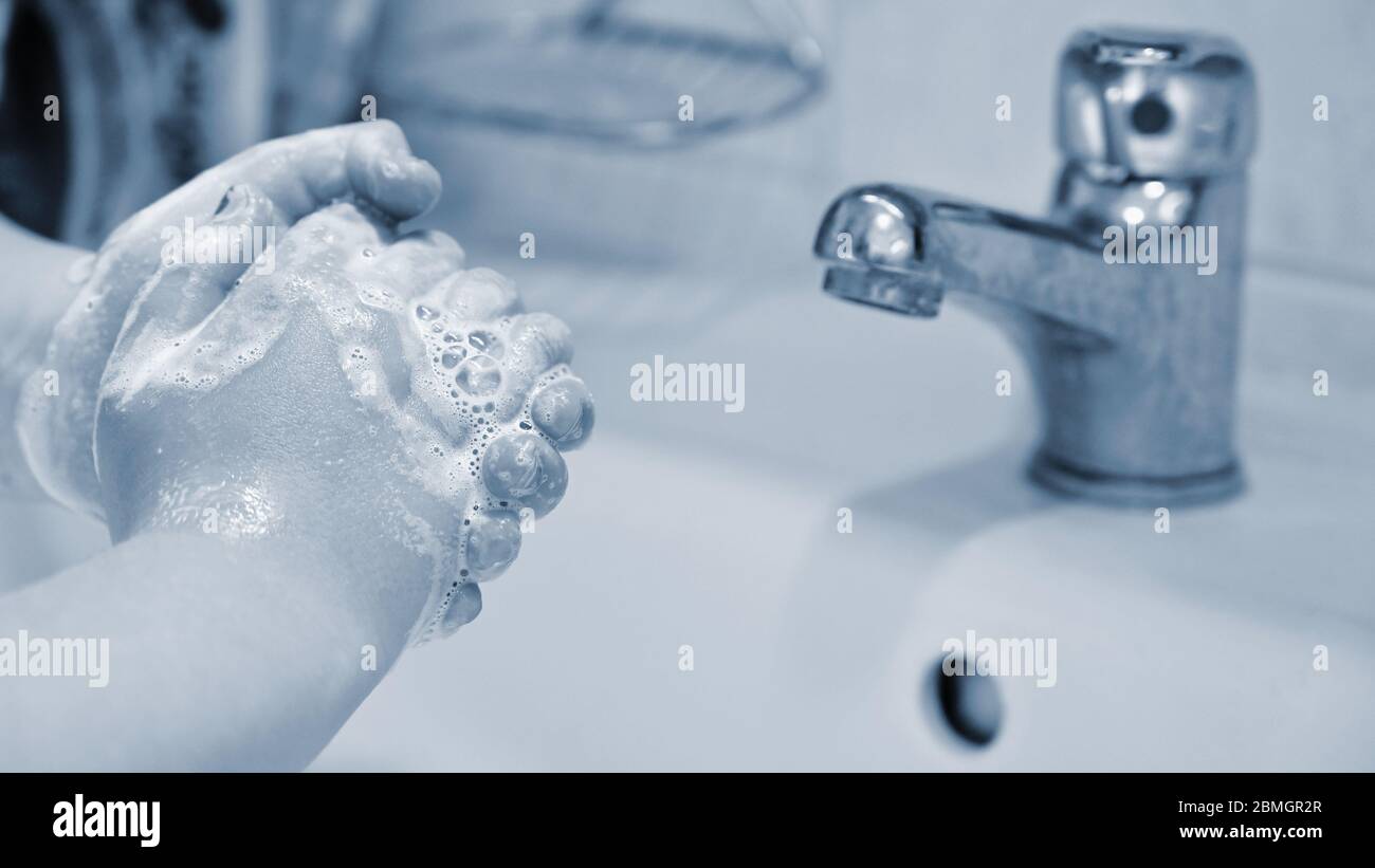 Thorough hand washing with disinfectant soap. Quarantine - domestic hygiene. Measures against coronavirus disease. (COVID-19) Stock Photo