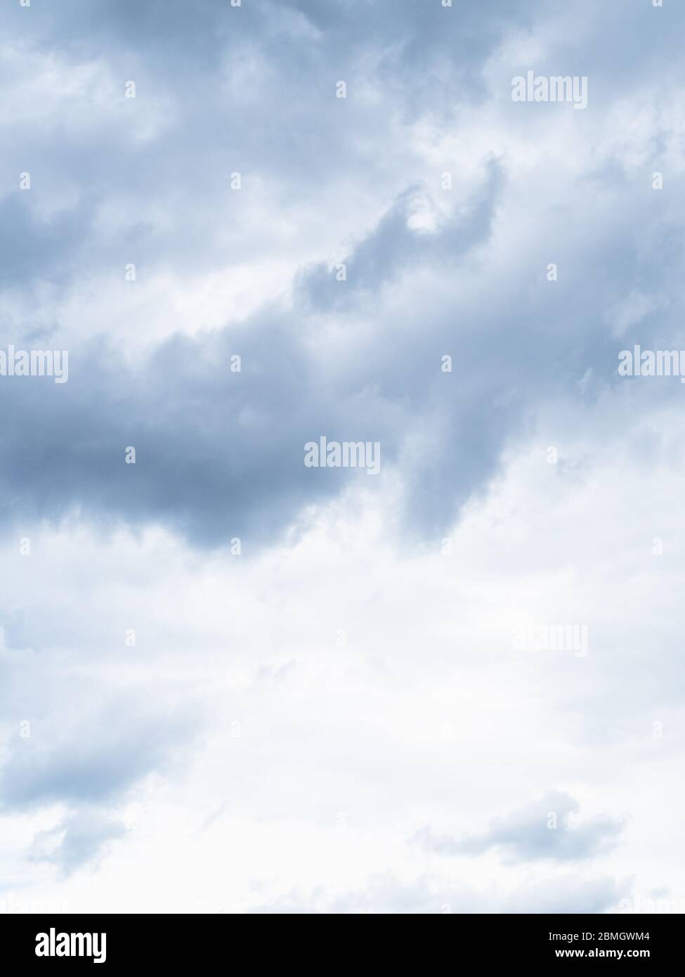 natural vertical background - gray thunderclouds in spring sky Stock Photo