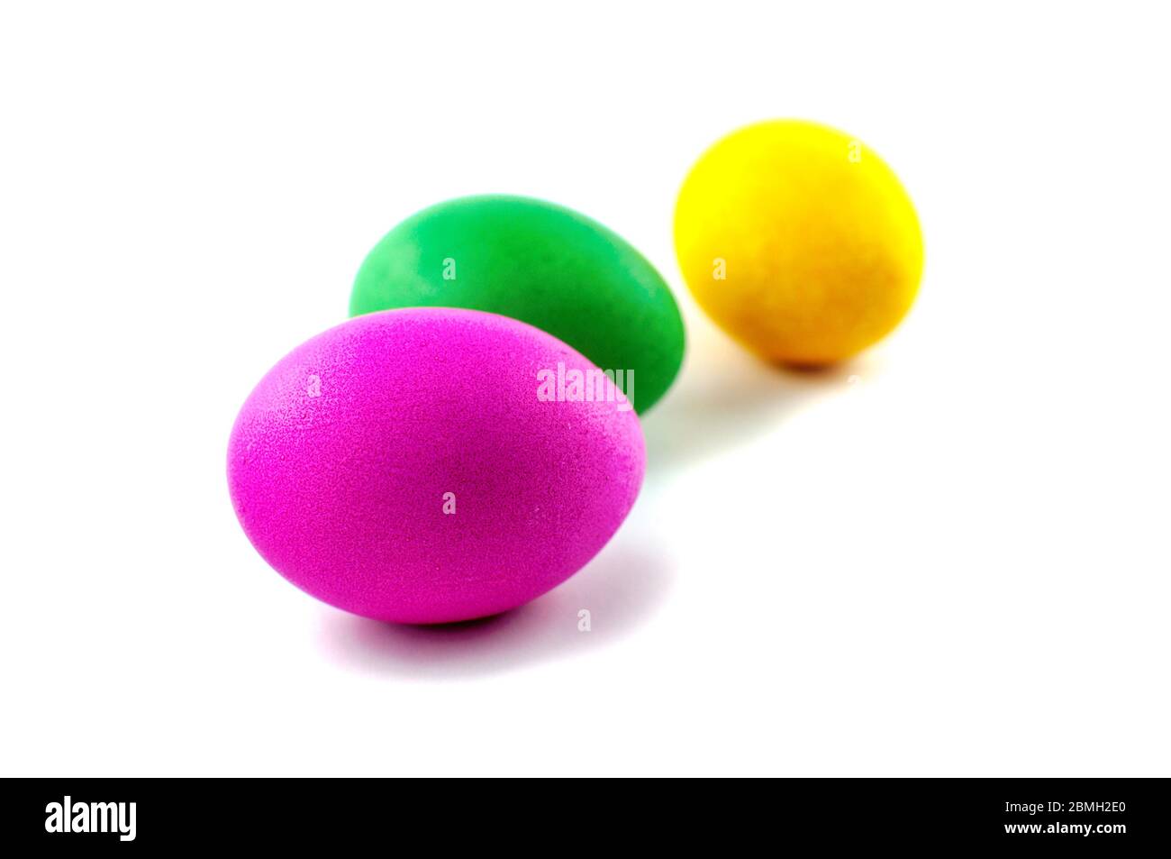 Two easter eggs, red and green, isolated on white background, colored ...