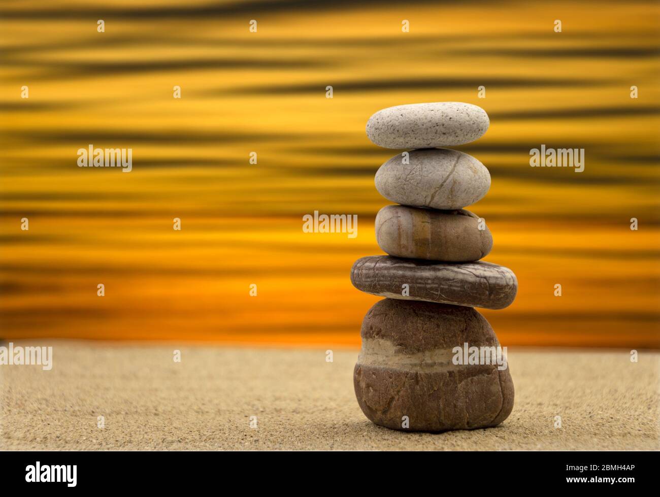 Zen stones balanced on the beach Stock Photo